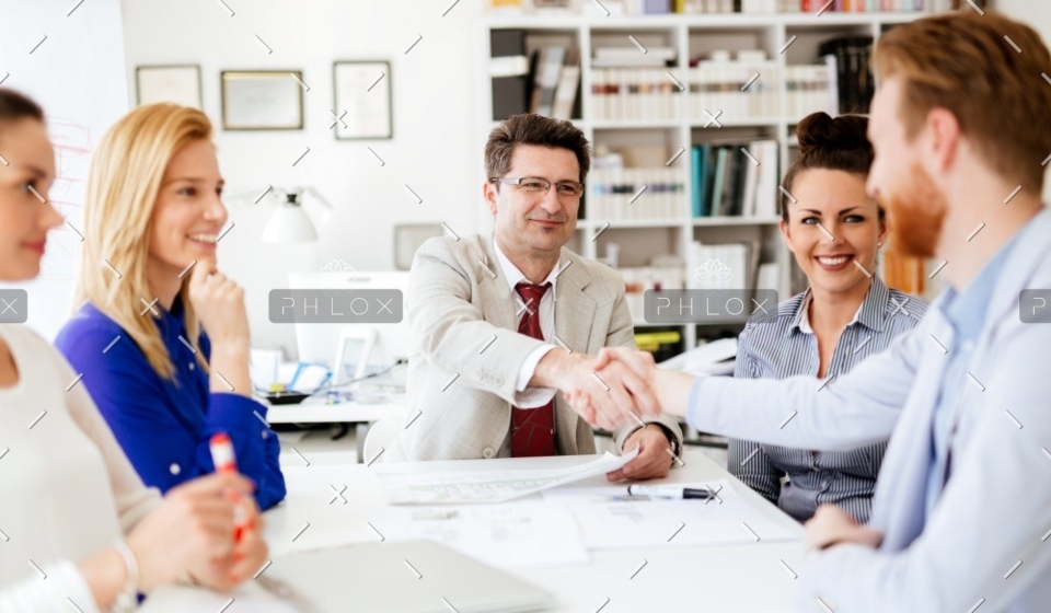 demo-attachment-642-group-of-business-people-working-as-team-in-9HPC4DK-1